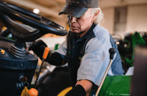 Technician inspecting equipment